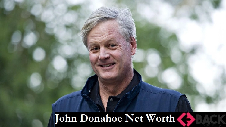 John Donahoe net worth 2025 - Nike CEO photographed at corporate headquarters, representing his journey to financial success and business leadership