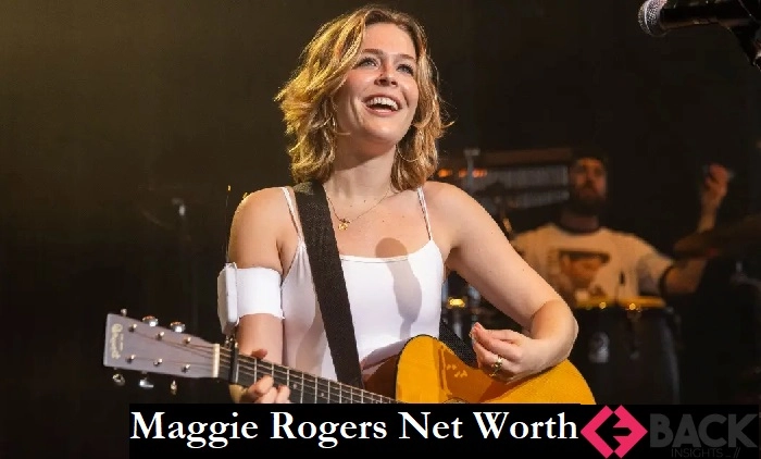 Maggie Rogers performing on stage - American folk-pop artist with estimated net worth of millions in 2025