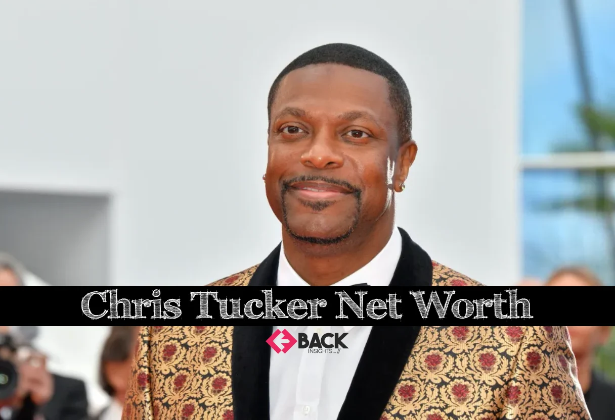Chris Tucker Net Worth: From Hollywood's Highest-Paid to $5 Million Today - Success Stories - BackInsights Actor Chris Tucker smiling at a red carpet event, symbolizing his Hollywood career and financial journey with focus on Chris Tucker Net Worth.