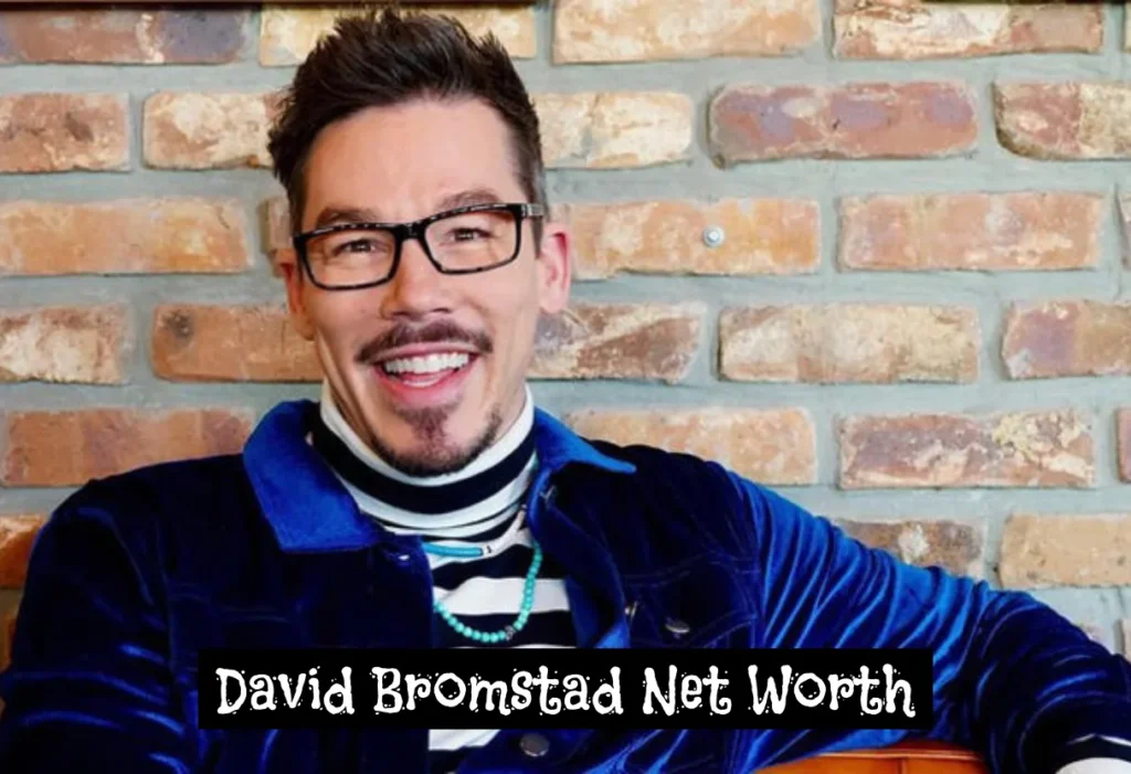 David Bromstad smiling in a stylish home interior, representing success and creativity related to David Bromstad Net Worth.
