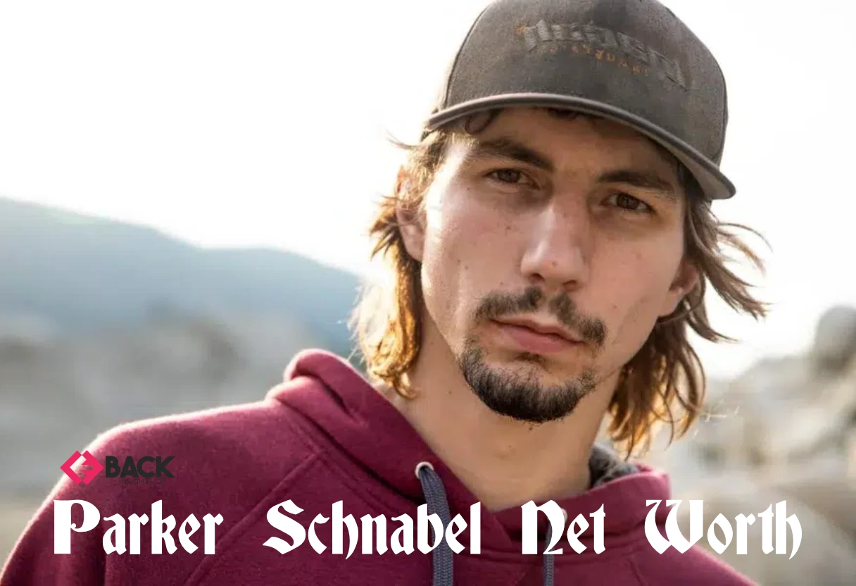 Parker Schnabel net worth showing the famous Gold Rush star, successful gold miner, and entrepreneur posing at a mining site